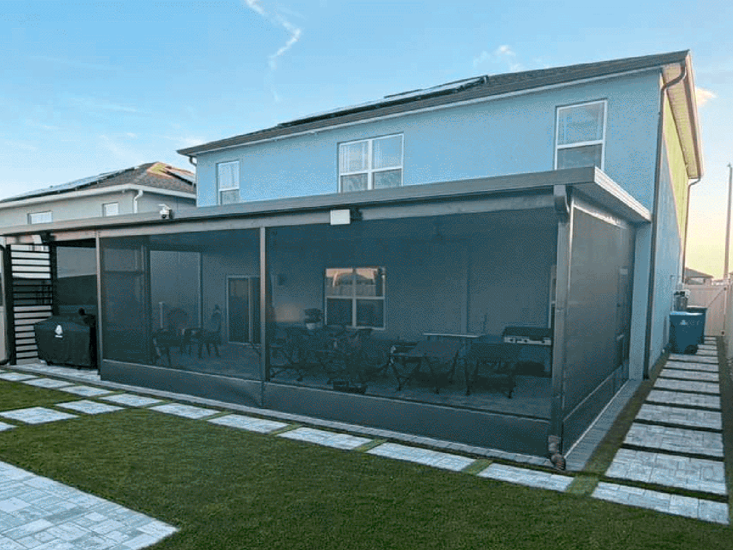 Covered patio with screen enclosure seating Orlando FL