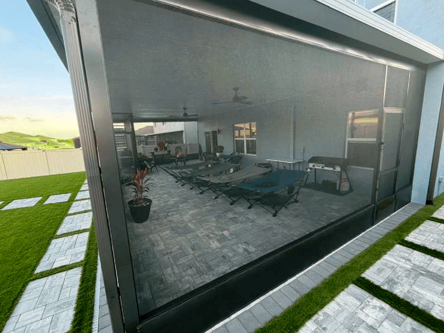 Backyard screened patio with furniture Orlando FL