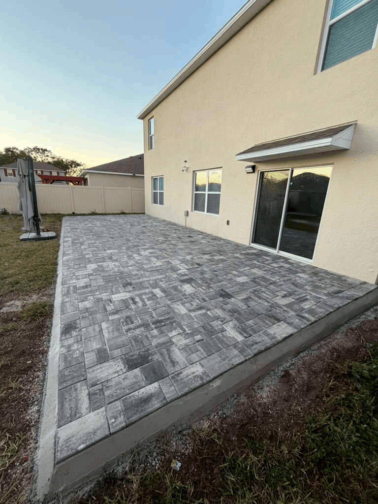 Backyard concrete pavers installation Orlando